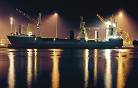 crane loading on ship image